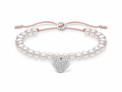 Silbernes Armband der Thomas Sabo Charming Collection mit Perlen und einem herzförmigen Zirkonia-Anhänger, verstellbar von 13 bis 20 cm, gefertigt aus Nylon.