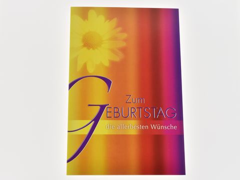 Geburtstagskarte - Gelbe Blüte auf rotem Untergrund