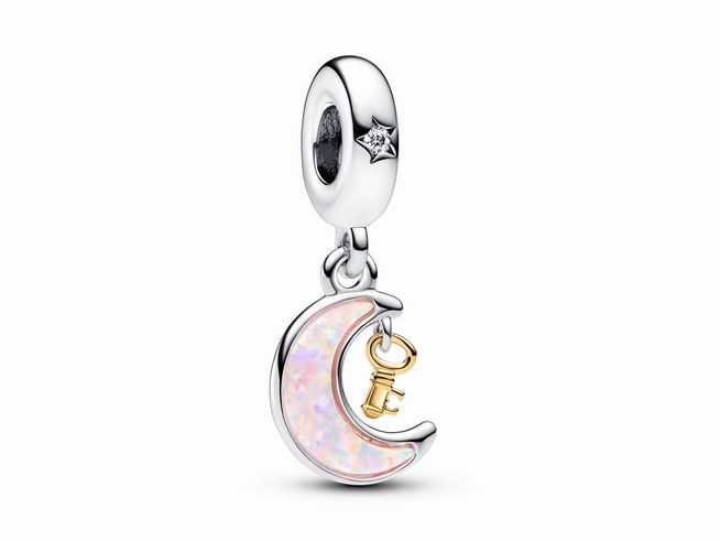 Bicolor Schlüssel und Mond Charm-Anhänger von Pandora, gefertigt aus Sterling Silber und vergoldetem Gelbgold, mit einem pinken Steinmix und einem filigranen Design.