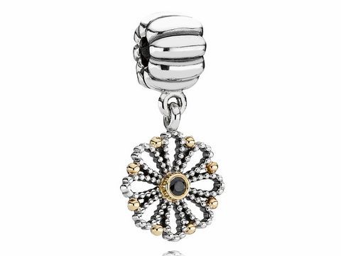 Pandora 790874CZK bicolor Clip Stopper mit schwarzem Zirkonia und filigranem Design in Silber und Goldakzenten, ideal für Armbänder und eine elegante Ergänzung.